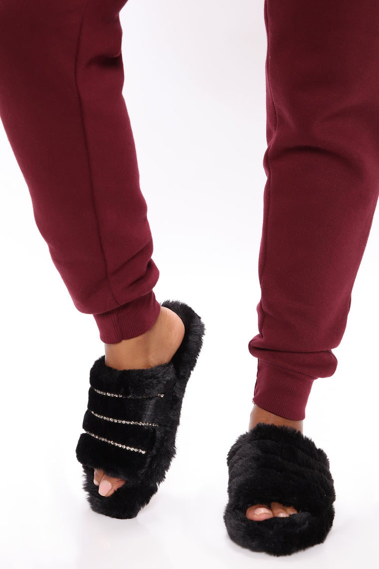 black faux fur slides