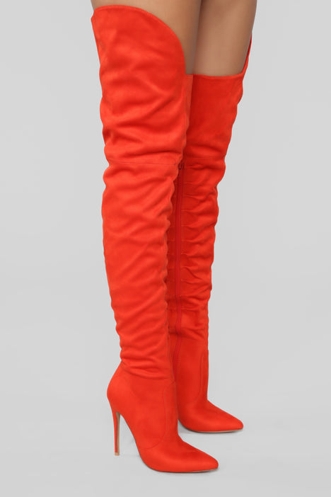 neon orange thigh high boots