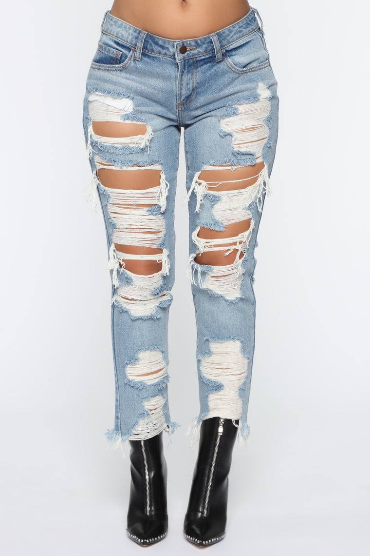 ripped jeans in front and back