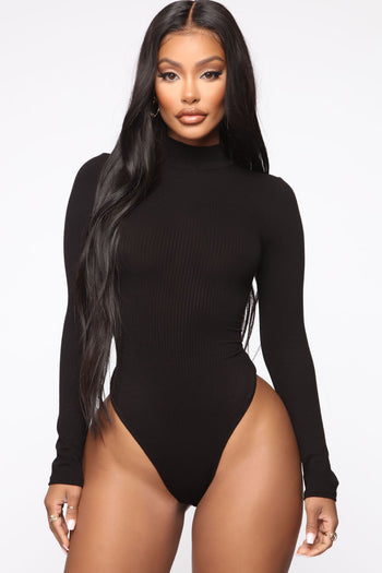 Fashion Nova black long sleeve body suit 🎀 size - Depop