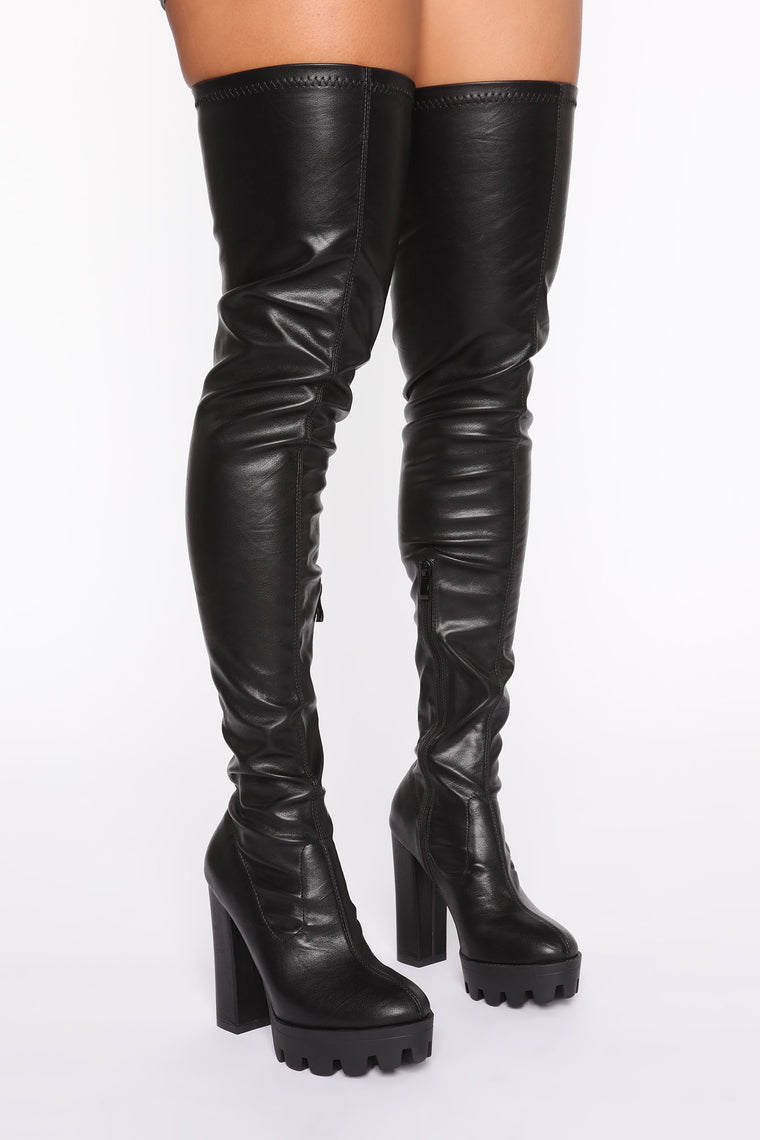 walking in thigh boots