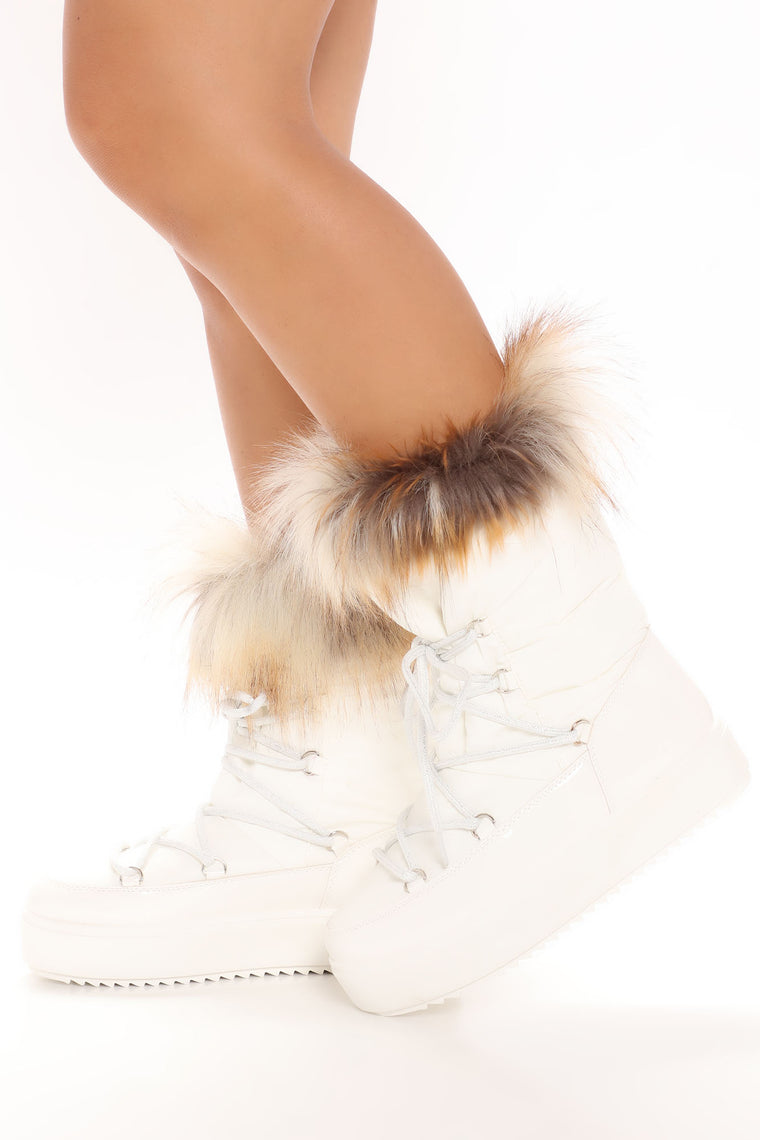 white boots with fur trim