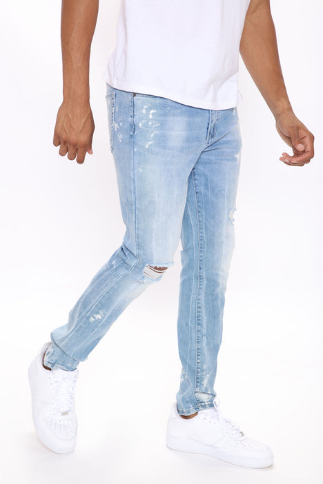 mens light wash tapered jeans