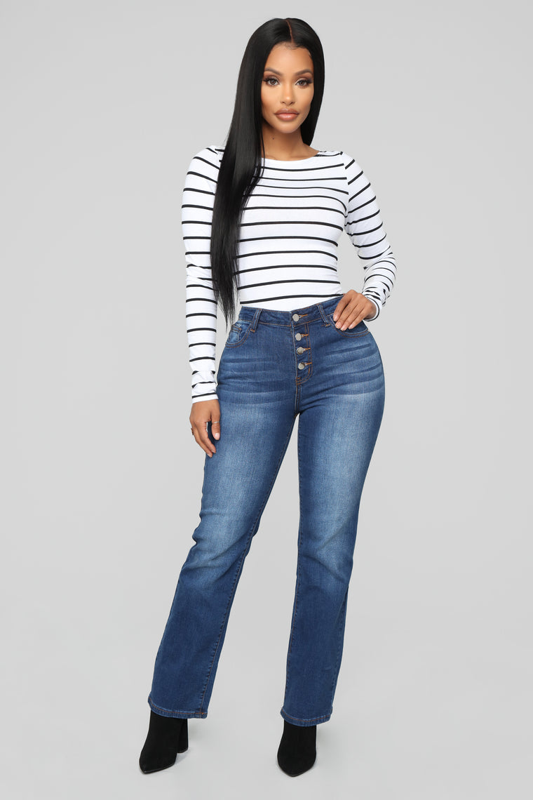 black and white striped top with jeans