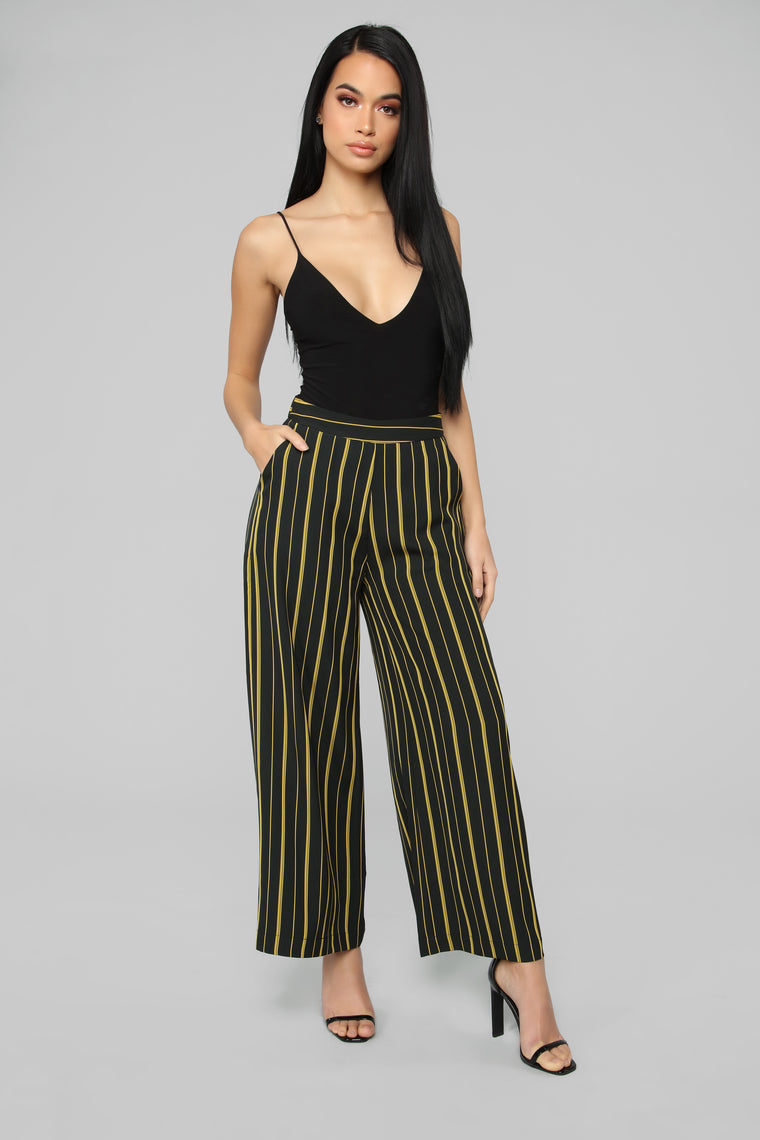 yellow pants black stripe