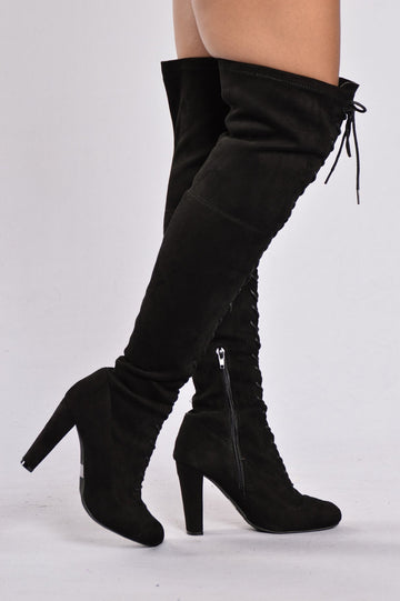 tall black thigh high boots