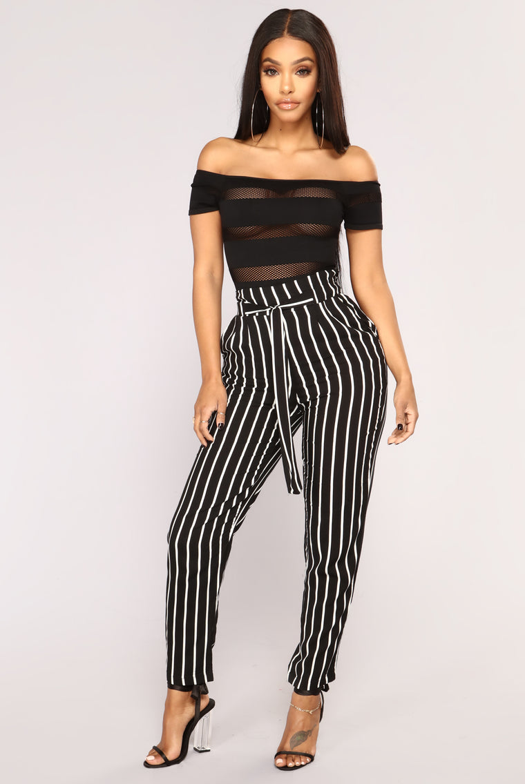 striped black and white pants outfit