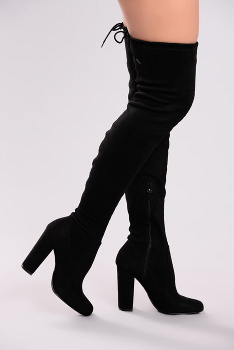 black thigh high boots low heel