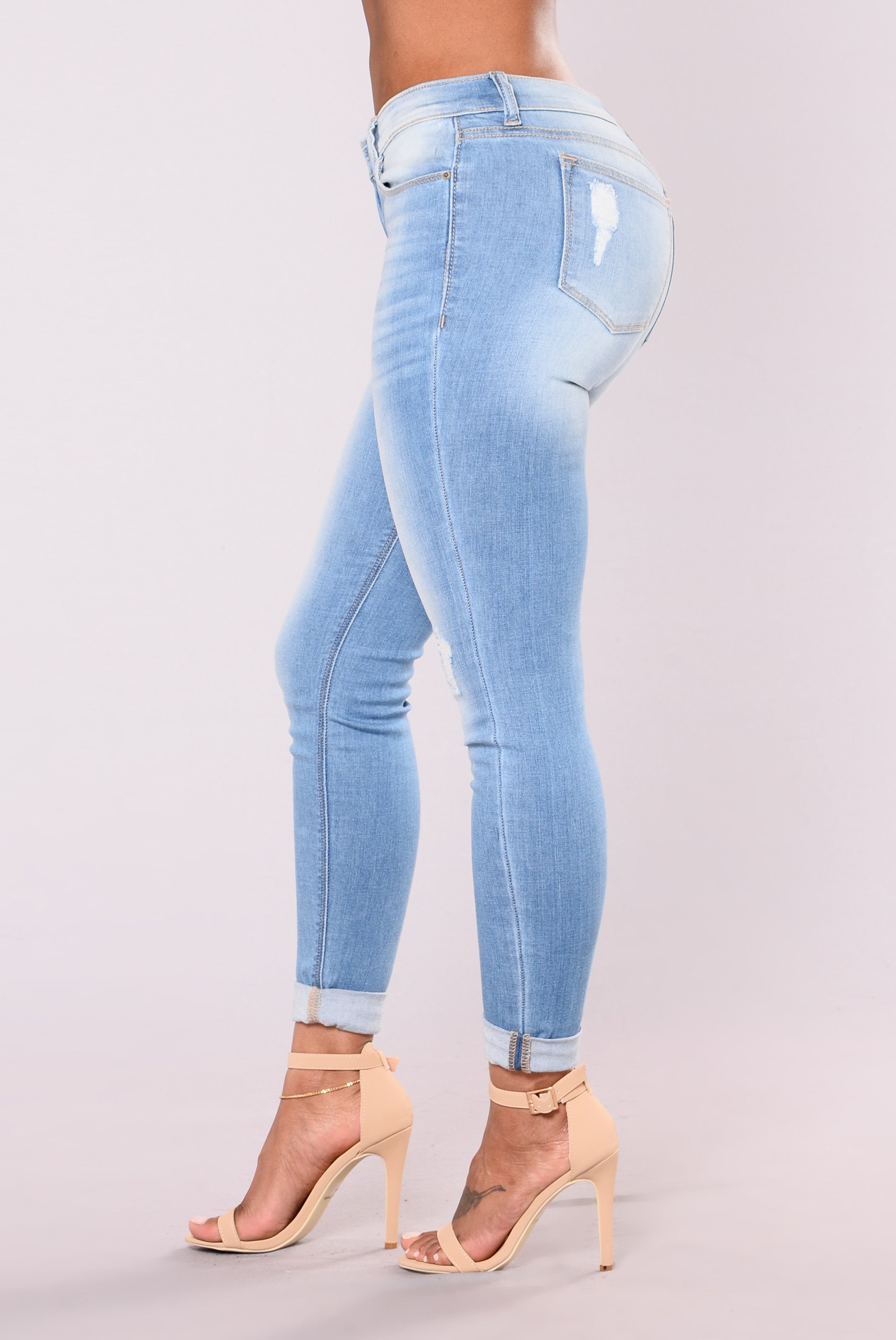 Low rise skinny jeans tinted blue sea india and tops