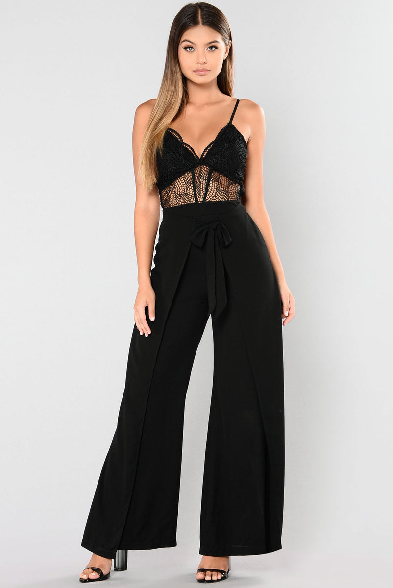 black fashion nova jumpsuit with flowers