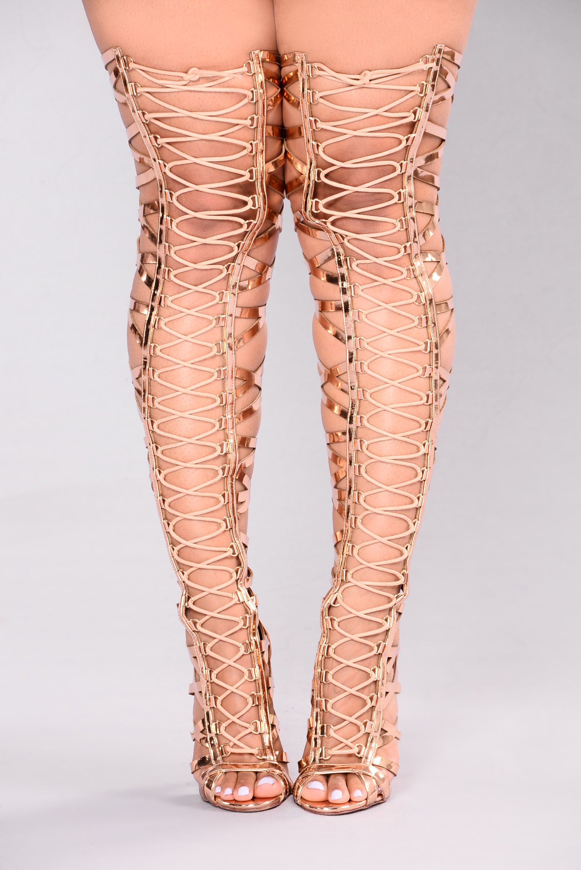 over the knee gladiator heels