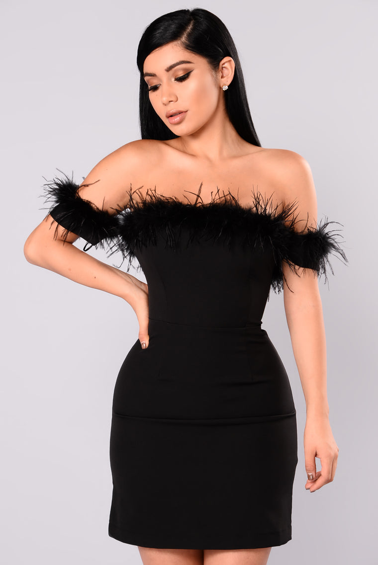 black dress with fluffy trim