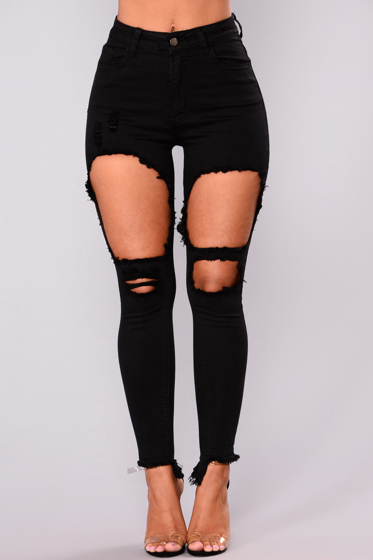 stretch black ripped jeans