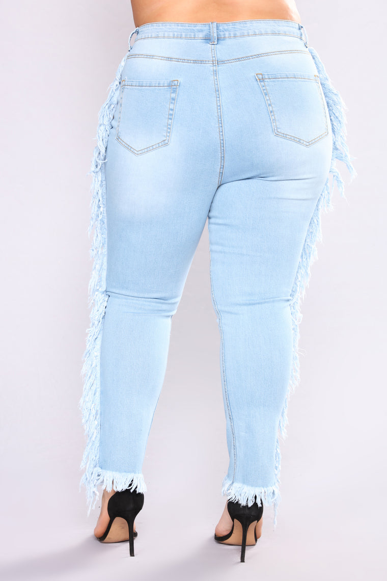 jeans with white fringe on the side