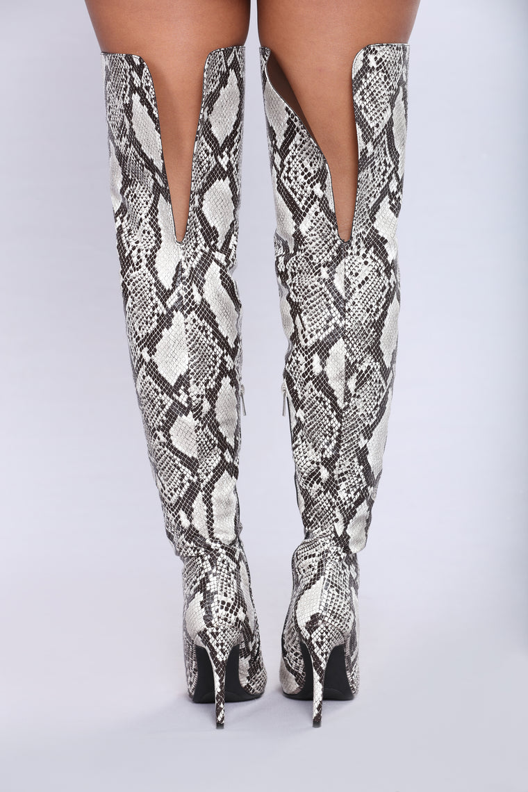 snakeskin over the knee boots