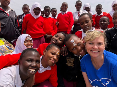 An UhuruPads Menstrual Hygiene Ambassadors With School Girls In Tanzania
