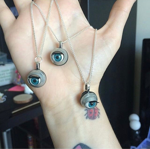 alternative jewellery blinking doll eye necklace jawline jewellery