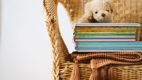 books stacked on chair, sweetest NICU books