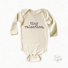 preemie onesie with the words "tiny valentine" on the front