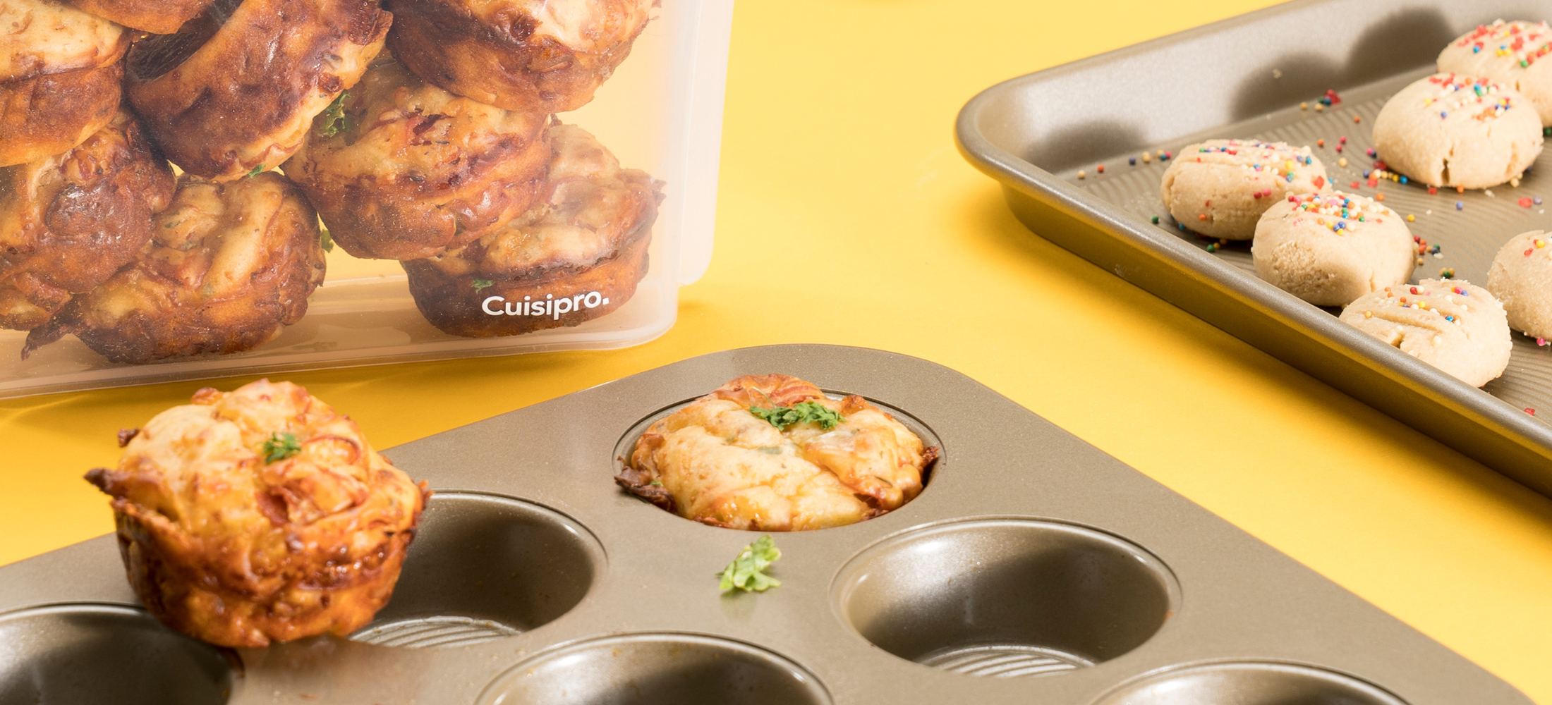 Cuisipro's kid friendly pizza muffin recipe. Showing cooked pizza muffin, in cuisipro muffin tin and extra in cuisipro reusable  bag.