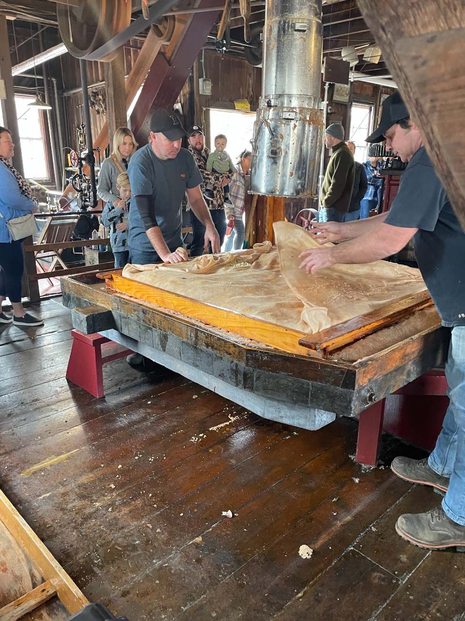 Factory Workers Pressing Apples