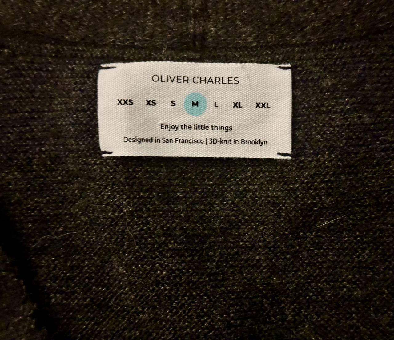 Oliver Charles Sweater Tag.jpg__PID:8de55862-0f37-4b8b-9024-e8c92d1010cc