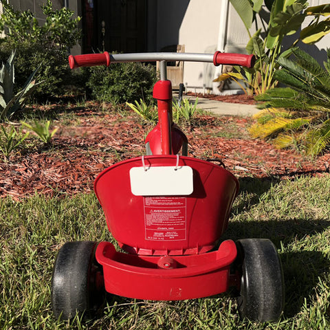 2x4 name plate on child's radio flyer