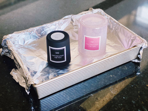 Malibu Apothecary Candles placed upside down in the oven to remove candle wax from the jar
