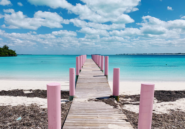 Bahama Beach club in Treasure Cay pink pier in Abaco by Malibu Apothecary