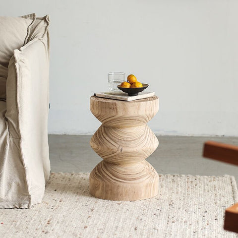 Carved from wood this table embodies the tranquility of a Japanese garden and the simplicity of Nordic design.
