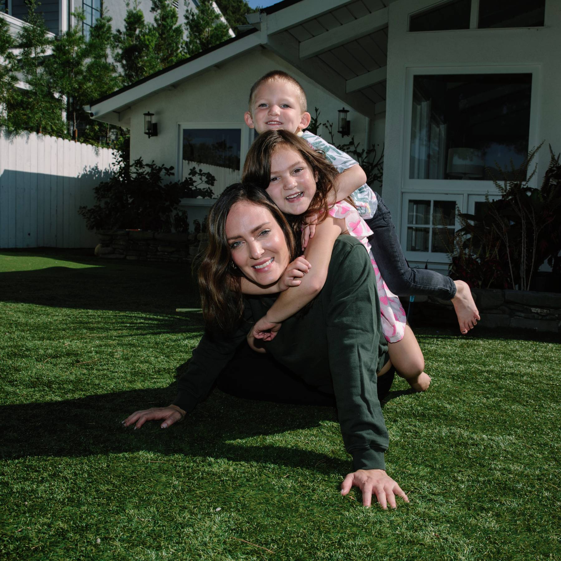 Lauren Wolk-Goldfaden and her children posing for the camera