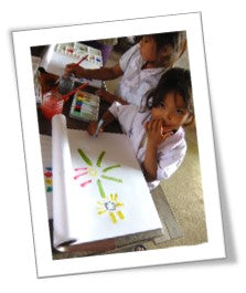 Children drawing in Cambodia