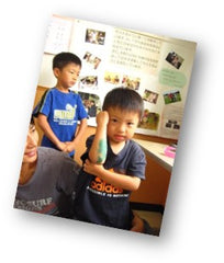 Children at a Tohoku rakugaki art workshop