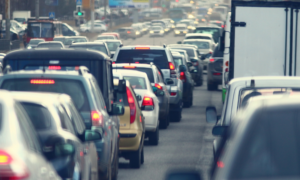 Image of a traffic Jam polluting the atmosphere, creating toxins