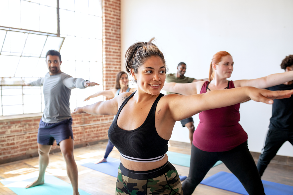 Bunch of Women doing a fitness class