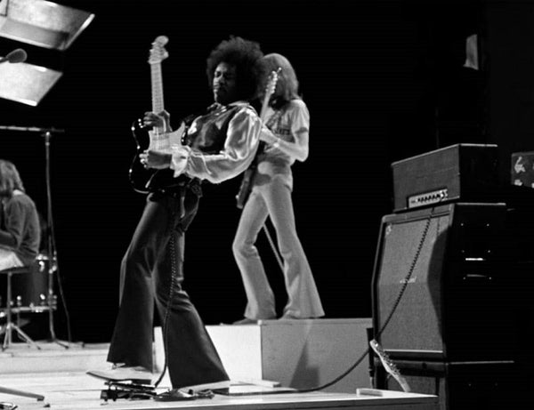 Jimi Hendrix using his wah pedal.