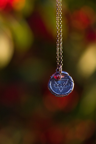 silver earth sign medallion layering necklace