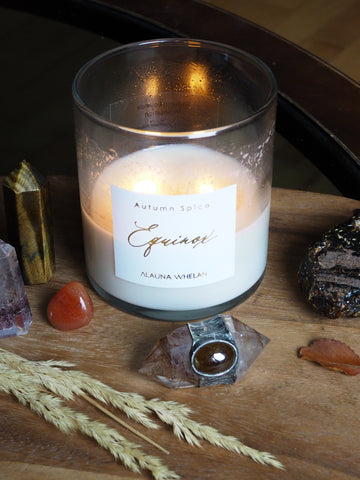fall equinox candle on wooden altar tray with crystals and crystal wand altar art