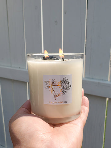 hand holding luxury soy crystal infused candle for virgo, capricorn, taurus earth signs
