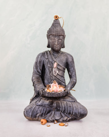 laura farrell photography of buddha wearing pink and clear crystal talisman kuan yin necklace