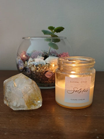 soy summer solstice candle with large crystal and succulent