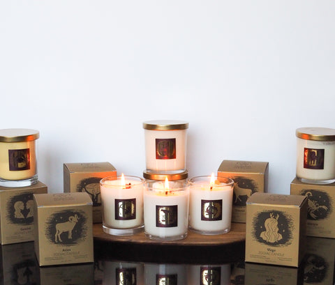 collection of soy zodiac intention candles