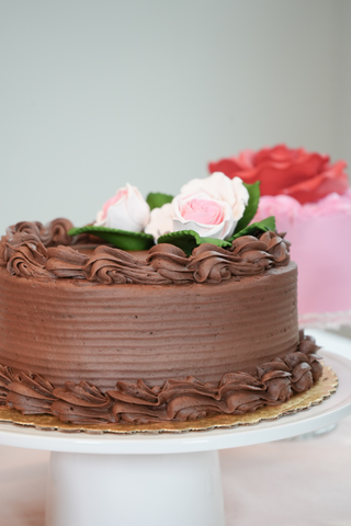 chocolate cake with pink sugar flower