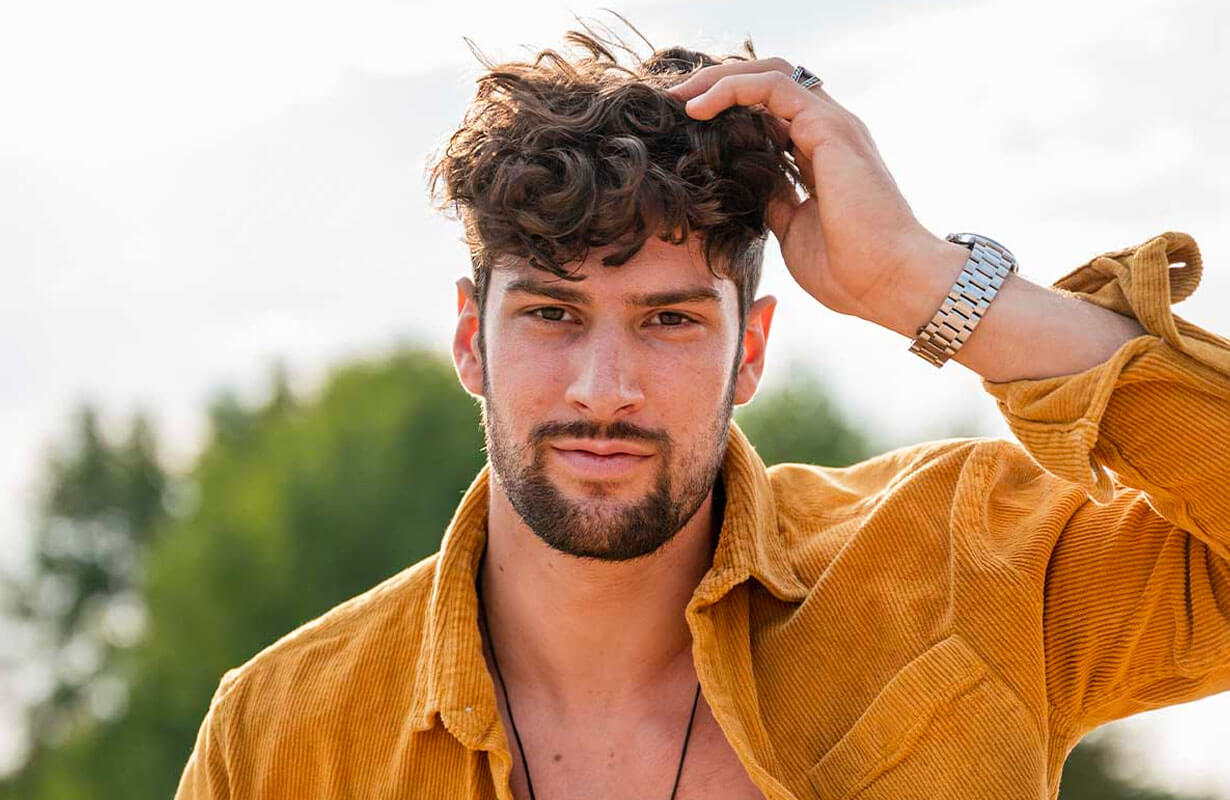 2. "The Best Haircuts for Men with Curly Hair" - wide 6