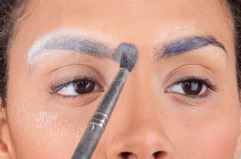 Photo of eyebrows covered with makeup