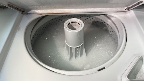 sudsy water inside washing machine 