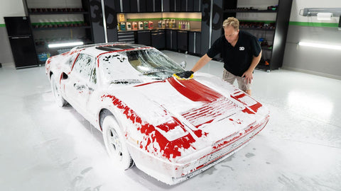 washing sudsy car by hand 