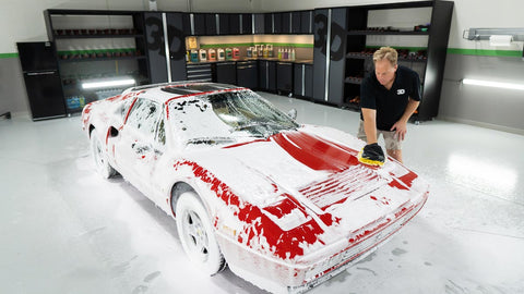 washing sudsy car by hand 