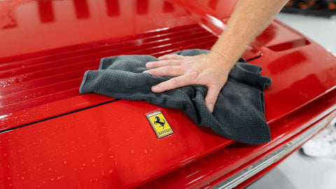 drying car with microfiber towel 