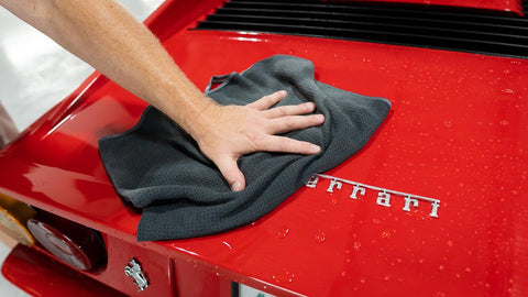 drying car with microfiber towel 